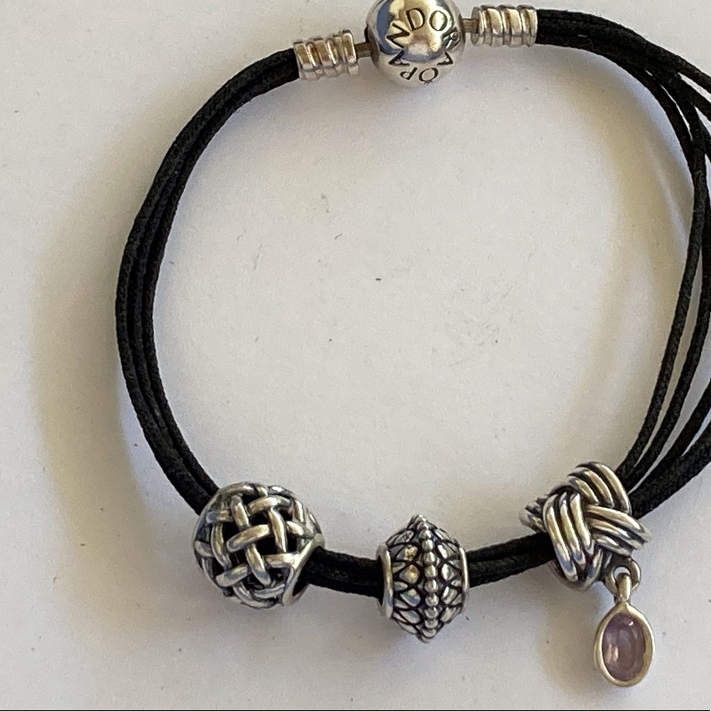 Pandora black leather Pandora bracelet with 3 Sterling Silver Pandora Charms